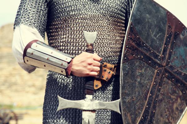 knight in armour with shield and sword