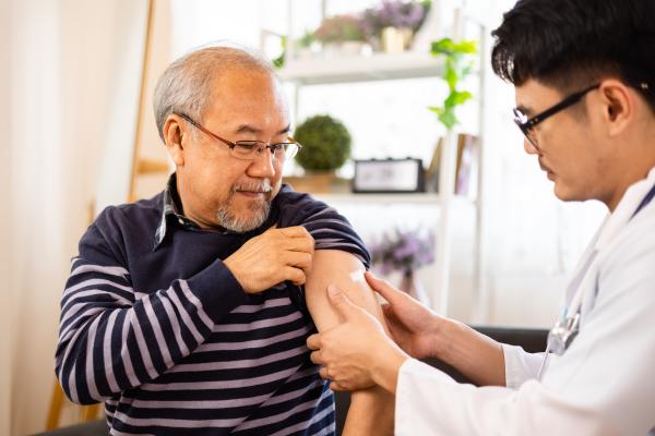 Older man getting his COVID-19 vaccination