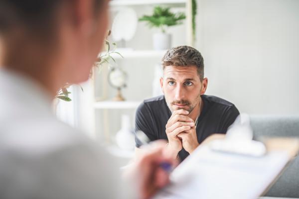 Male patient considering pharmacotherapy treatment for opioid dependence