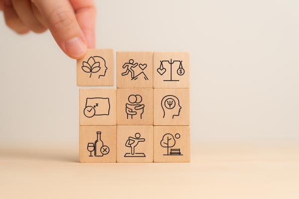 holistic health concept wooden block icons