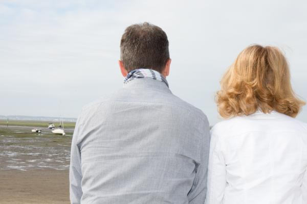 rear view of man and woman sitting together