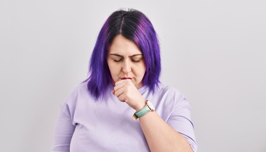 Woman with purple hair and severe asthma