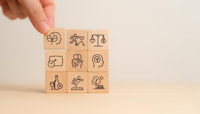 holistic health concept wooden block icons
