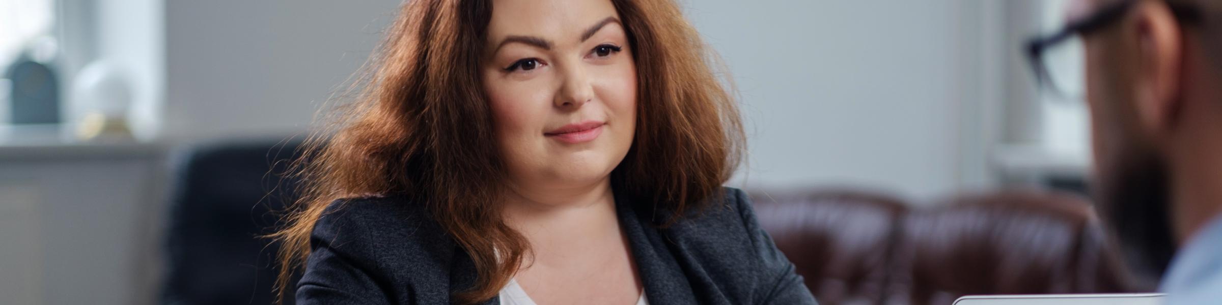 Overweight lady in consultation with doctor