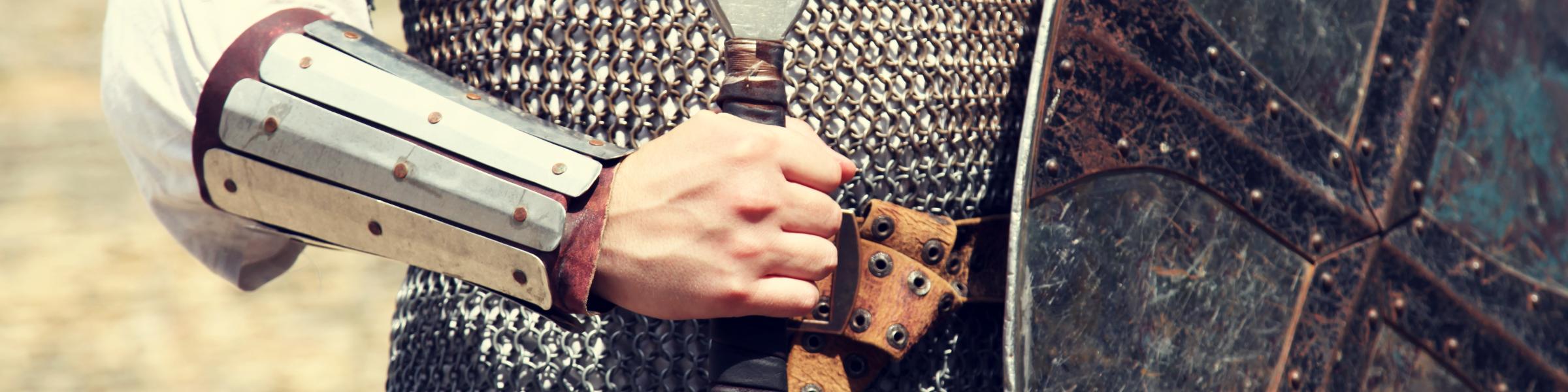 knight in armour with shield and sword