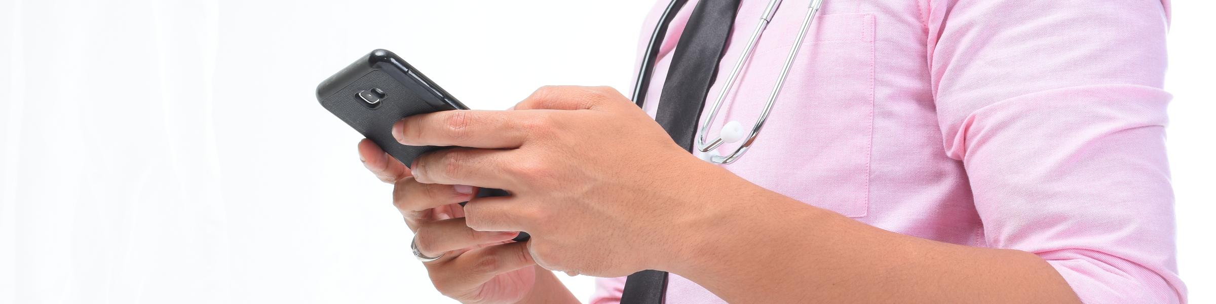 Man with diabetes checking his blood glucose on his phone