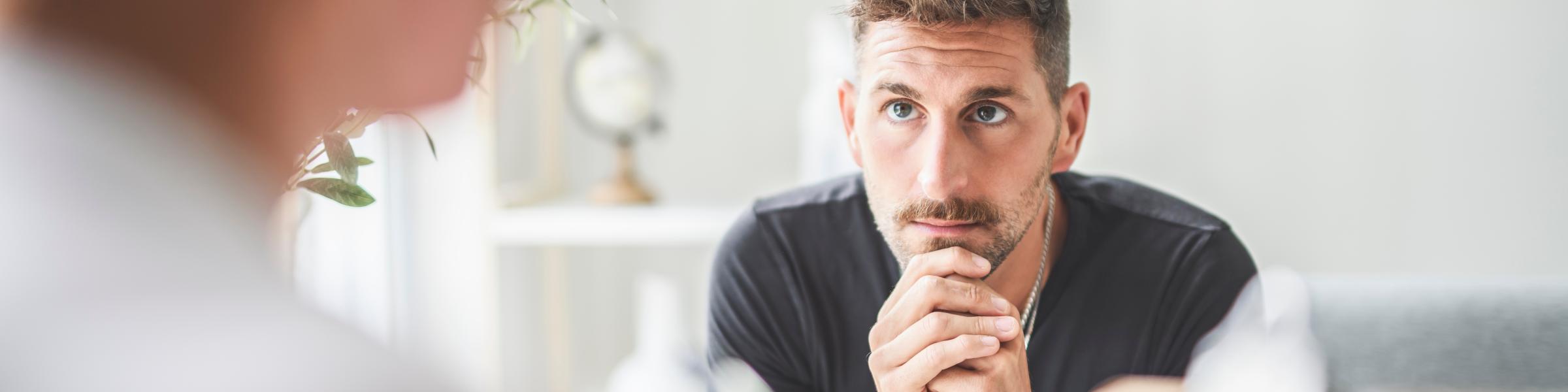 Male patient considering pharmacotherapy treatment for opioid dependence